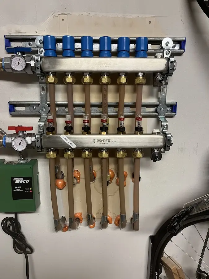 Plumber performing Gas Line Installation at a residential property in Grants